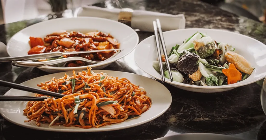 A spread of Cantonese seafood delights plated at Chows restaurant in Dhaka.
